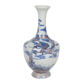 A Chinese blue and white and underglaze copper red 'dragon' vase