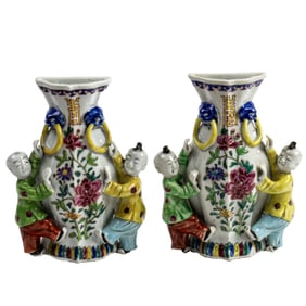 A pair of Chinese export famille rose wall vases