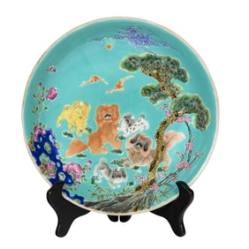 A Chinese famille rose turquoise-ground 'five lion dogs' dish