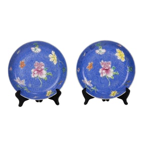 A pair of Chinese blue-ground famille rose dishes