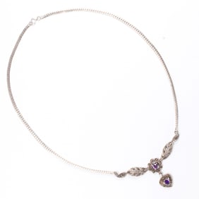 A hardstone and silver necklace