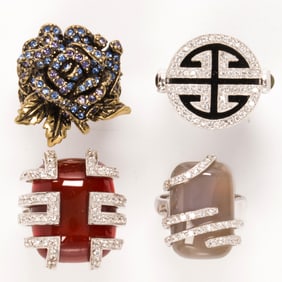 A group of costume jewelry rings