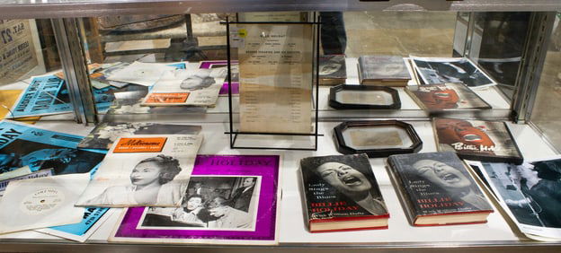 A Collection of Billie Holiday jazz memorabilia comprising a framed signature, (2) copies of 'Lady