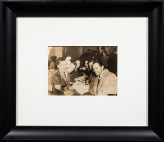A silver gelatin photo of Billie Holiday, Lester Young and others