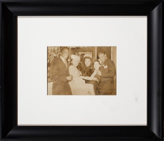 A silver gelatin photo depicting Dizzy Gillespie, Peggy Lee, Sarah Vaughn, Lorraine Gillespie and