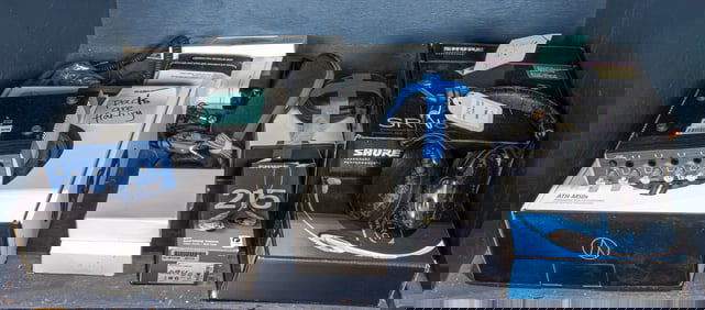 A group of mainly headphones and ear phones, including Shure Professional Monitoring Headphones