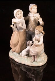 A Lladro porcelain figural group 'Christmas Carols'