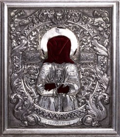 A framed silverplate icon oklad