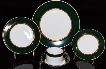A Fitz & Floyd porcelain dinner service in the Renaissance Dark Green pattern