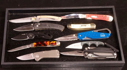 Ten contemporary outdoor, utility and sporting knives, including Case folder, Sog folder, Leatherman
