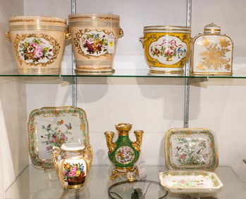 A group of mainly French porcelain table articles