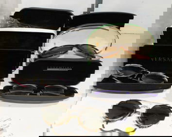 A group of vintage designer eyeglass frames, including Versace, Kate Spade, Lux de Paris, Bebe,