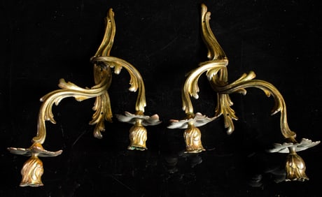 A pair of French two-light bronze wall sconces or bras de lumiere