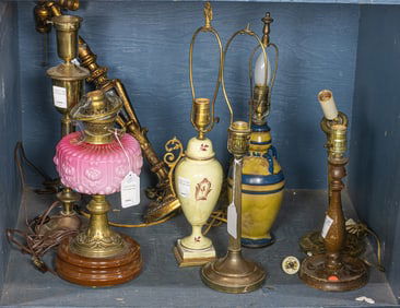 A group of eight table lamps in wood, metal, glass and ceramic