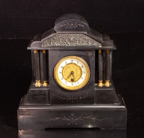 A French black slate architectrual mantel clock