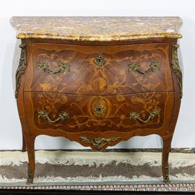 A French Louis XV marquetry decorated commode