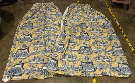 Two Travers & Co blue and yellow cotton 'Toile de Nantes' curtan panels from a Mario Buatta interior