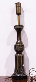 A Chinese archaistic bronze lamp in the manner of James Mont