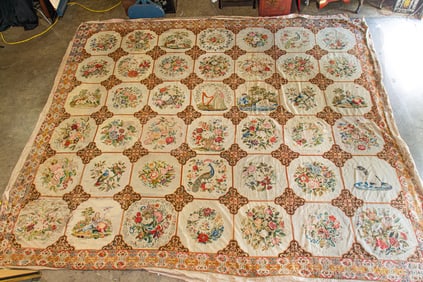 An Irish Parish-Hadley needlepoint rug (extensive damage)