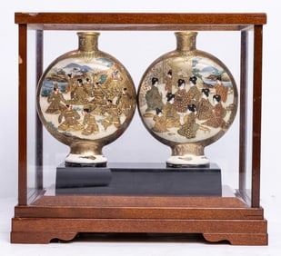A pair of Japanese Satsuma moonflask vases in glass case