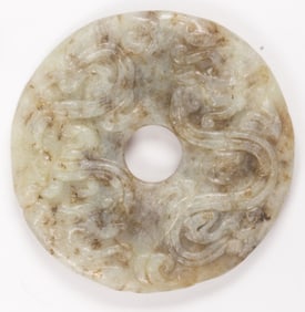 A Chinese celadon jade bi disc