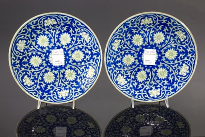 A pair of Chinese famille rose 'lotus' dishes