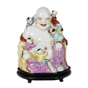 A Chinese famille rose figure of Budai