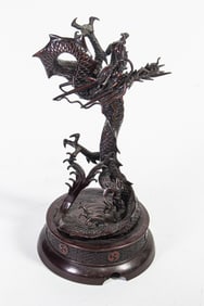 A Japanese patinated bronze dragon