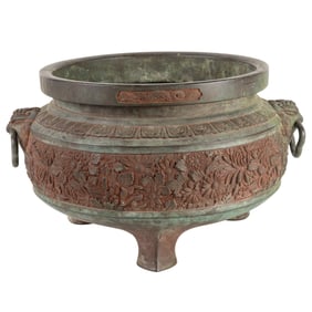 A Japanese bronze tripod koro