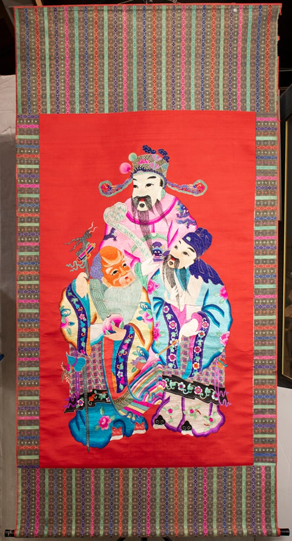 A Chinese embroidered panel of the Three Star Gods (1 of 2)