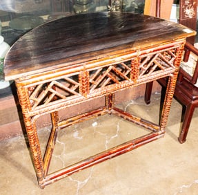 An Asian hardwood side table