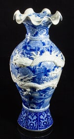 A Japanese Arita blue and white 'dragon' vase