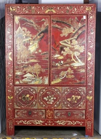 A Chinese gilt lacquered red-ground cabinet