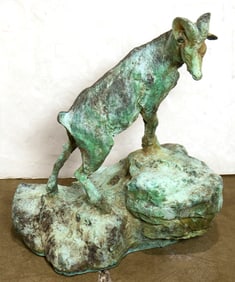 An Asian bronze garden figure of a mountain goat