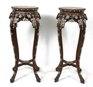 A pair of Chinese mother-of-pearl inlaid rosewood and marble planter stands