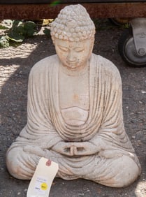 A Japanese cement figure of Buddha
