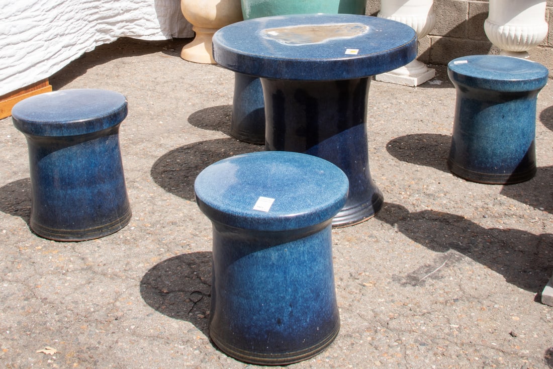 A set of five Chinese blue glazed garden tea table and seats: A set of five Chinese blue glazed garden tea table and seats. 20th century, 21.5"h x 24"w.
