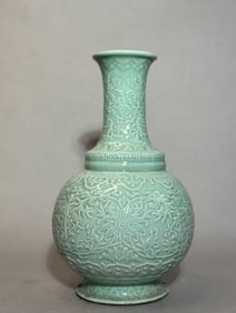 Chinese Celadon Porcelain with Molded Floral Design