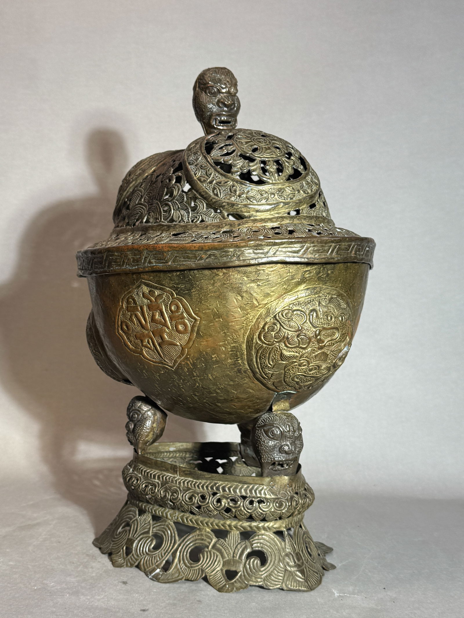 Tibetan Antique Copper Repouss???? Ritual Covered Urn of Skull Shape: Tibetan antique copper repouss skull shaped ritual object, trace of gilt, tarnished with age. 18.5" x 13"w (46.99 x 33.02 cm) NOTE: THIS ITEM IS IN NEW YORK, WHERE IT CAN BE SHIPPED FROM.