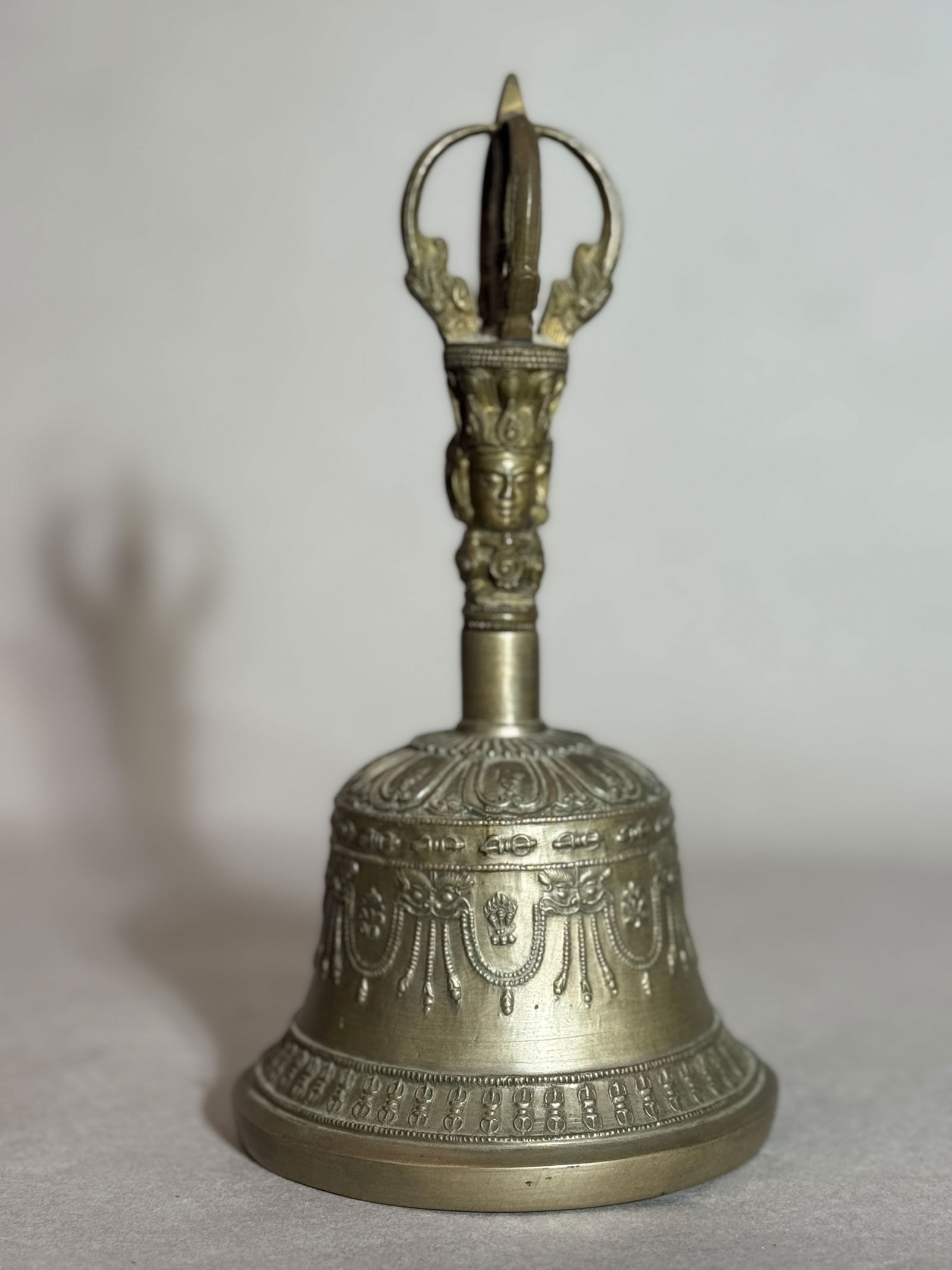 Tibetan Antique Bronze Bell: Tibetan antique bronze bell. 9"h (22.86 cm) NOTE: THIS ITEM IS IN NEW YORK, WHERE IT CAN BE SHIPPED FROM.