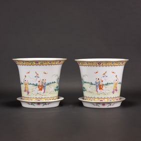 A Pair of Famille Rose 'Kids' Jardinieres and Stands