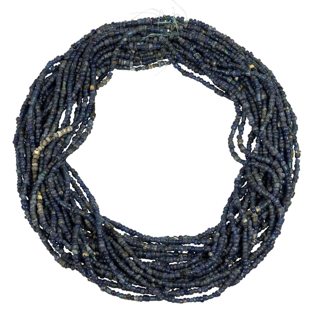 A group of Djenne blue glass beads from Mali: A group of Djenne blue glass beads from Mali. From 0.125" to 0.25" across. Provenance: Naomi Lindstrom collection.