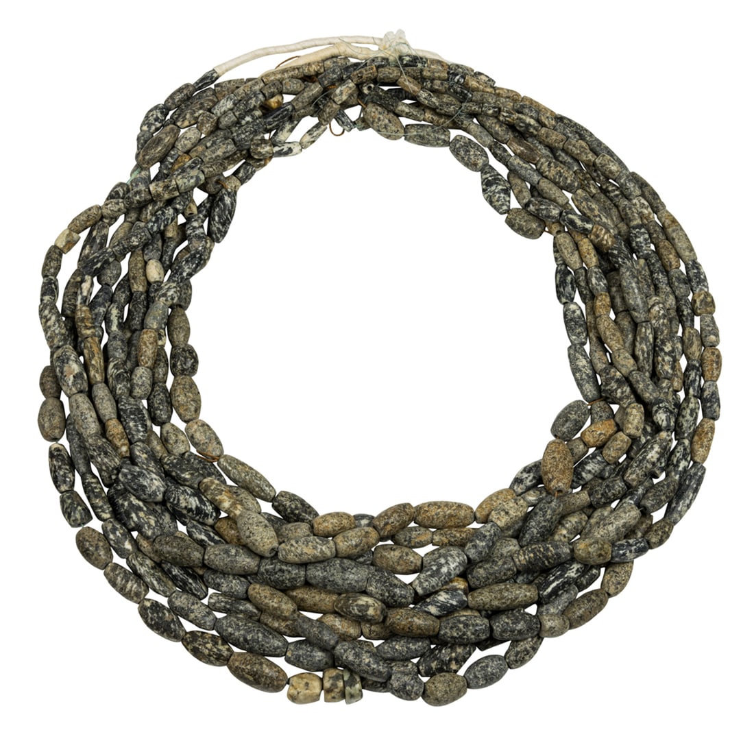 Ten strands of granite beads from Mali: Ten strands of granite beads from Mali. From 0.25" to 0.875" across, 29" longest. Provenance: Naomi Lindstrom collection.