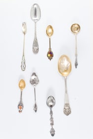 A collection of thirty-six sterling souvenir spoons, comprising spoons for cities across the country