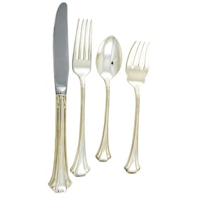 A Reed & Barton sterling flatware service in the Chippendale pattern