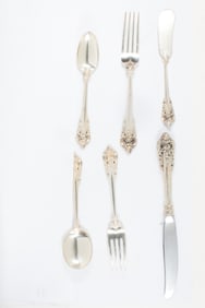 Seventy pieces of sterling flatware service in the Wallace Grand Baroque pattern