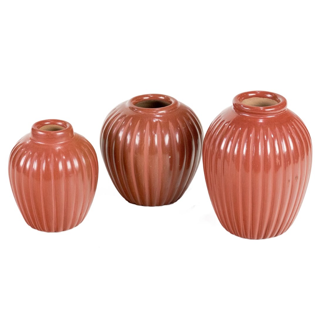 Three Alvin Baca Santa Clara redware ribbed mellon jars: Three Alvin Baca Santa Clara redware ribbed mellon jars, signed, between 4.5"h and 5.5"h