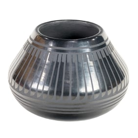 A Blue Corn (Crucita Gonzales Calabaza) San Ildefonso blackware pottery jar