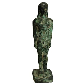 An ancient Greek bronze kouros of a male nude