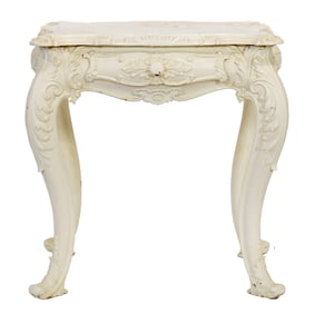A Rococo style painted cast iron side table